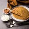 Sattu Parantha (2pcs) + Curd + Pickle + Sauce